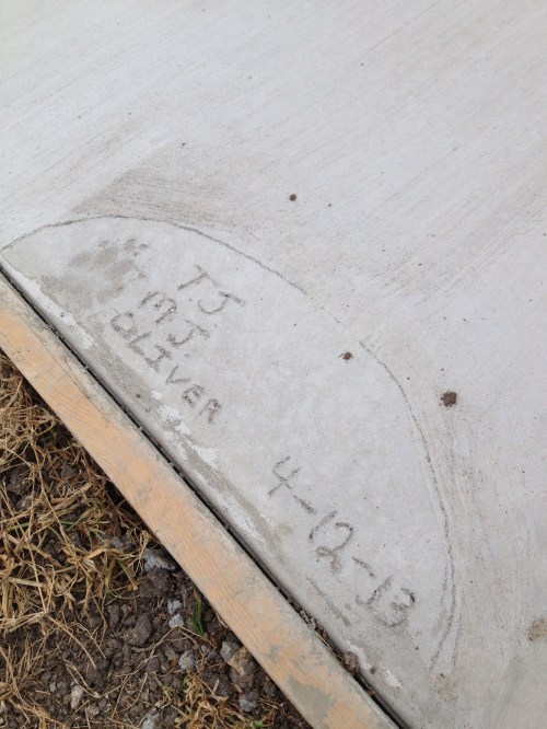 Michael was home the day they poured the concrete and wrote our initials and the date!